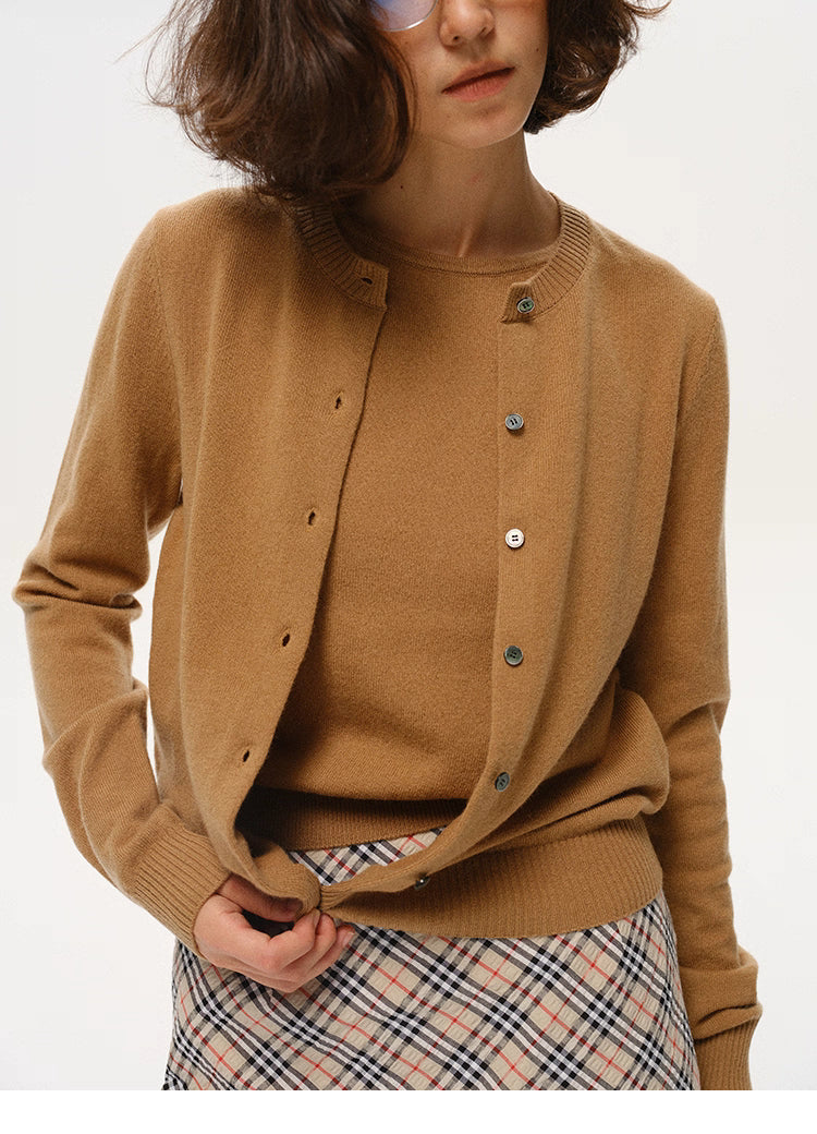 Close-up view of Camel Brown merino twin-set showing cardigan buttons and wool texture