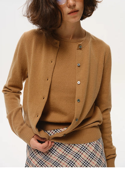 Close-up view of Camel Brown merino twin-set showing cardigan buttons and wool texture
