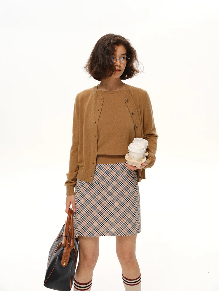 Camel Brown merino wool tank and cardigan twin-set, front view holding coffee cups