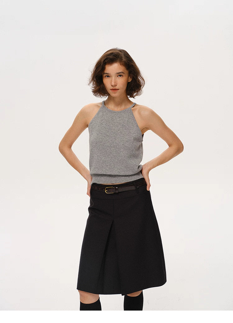 Heather Gray merino wool tank top styled with pleated skirt, full-body front view