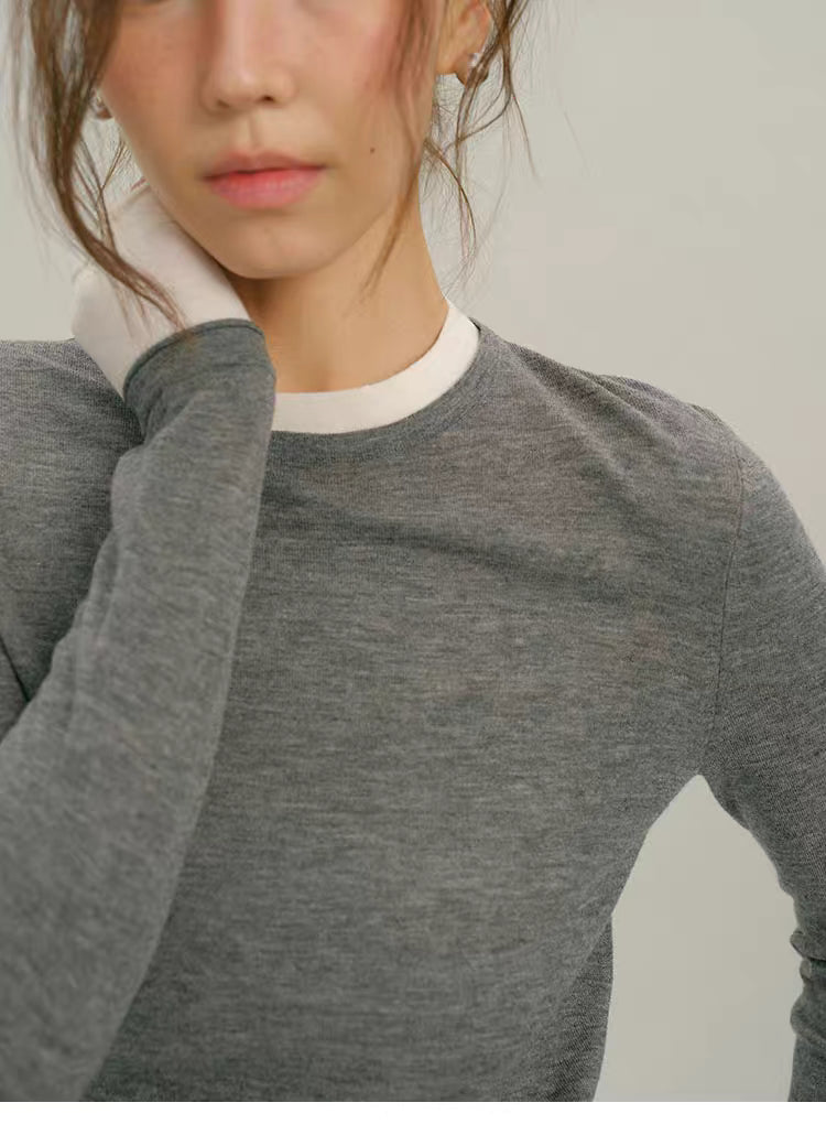 Close-up texture and neckline detail of Heather Gray layered-look wool top