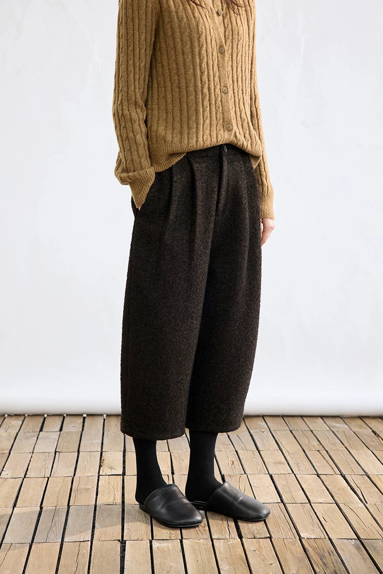 Side view of Dark Brown high-rise cropped bouclé trousers with front pleats