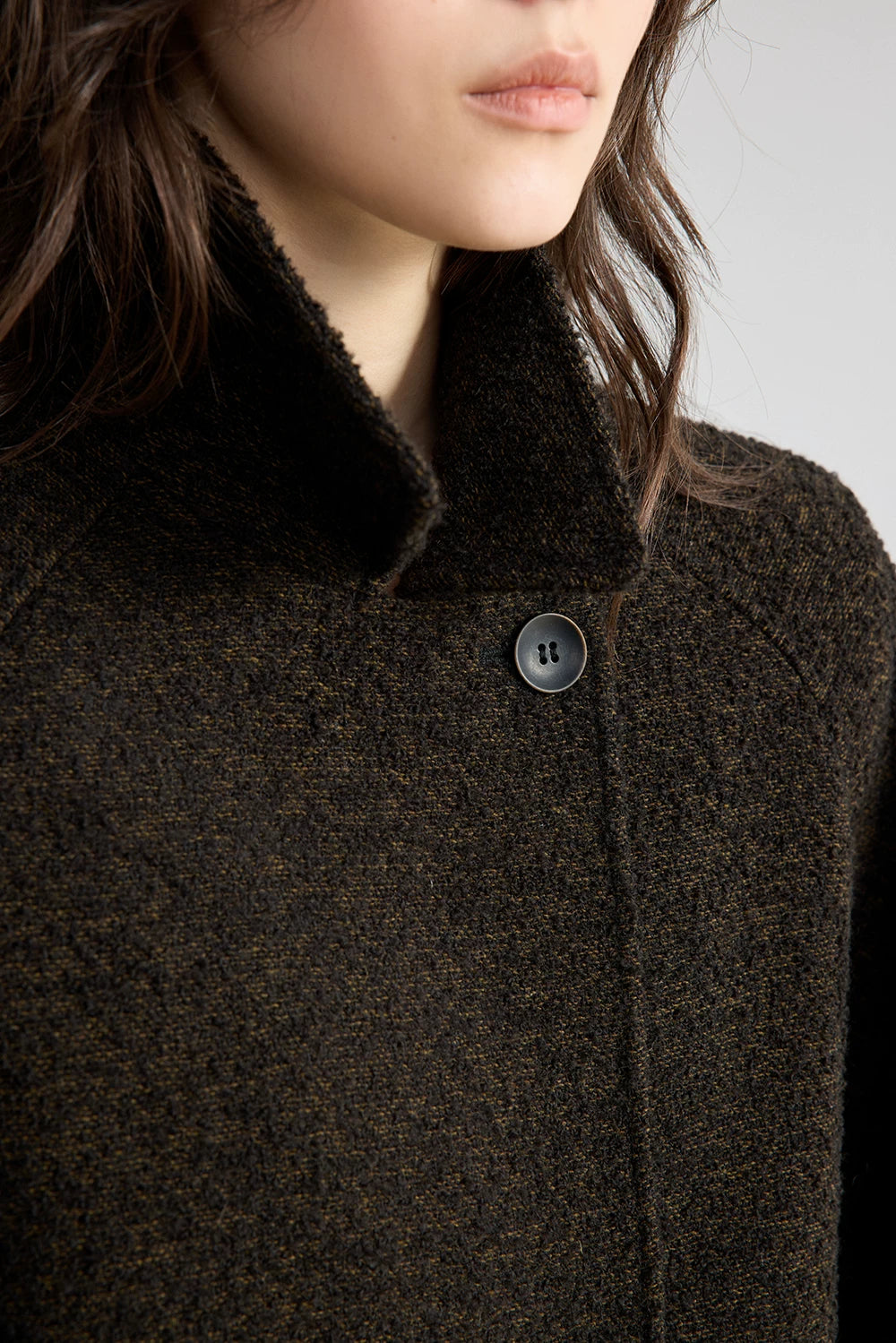 Close-up of a Dark Brown bouclé jacket&