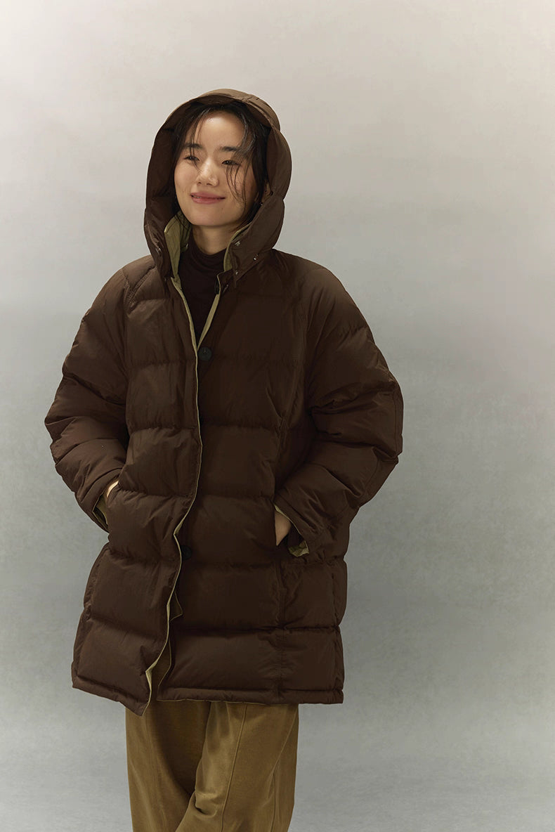 Front view of dark coffee brown down coat with detachable hood and relaxed mid length fit