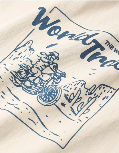 Desert Rider Graphic Cotton Tee Cream White close-up of motorcycle desert graphic showing cactus landscape and printed design detail