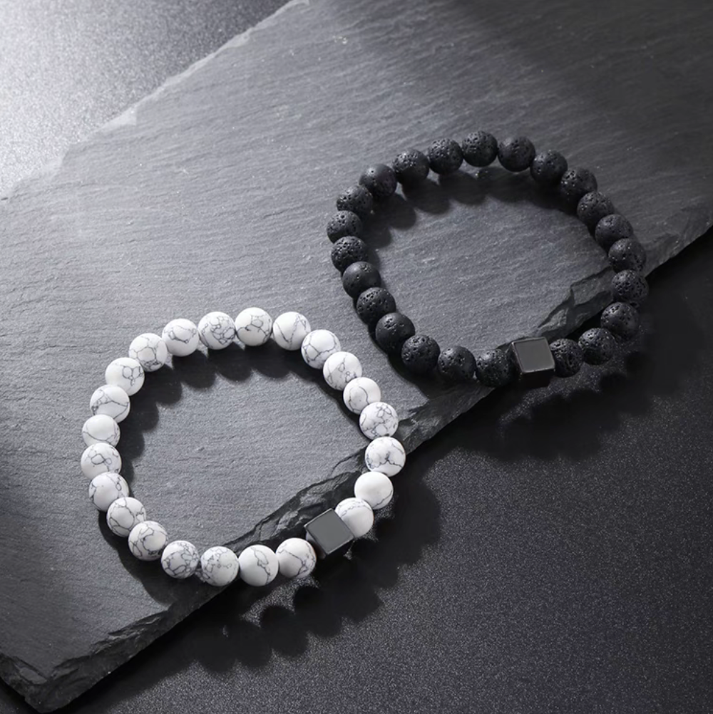 Dual-tone turquoise and lava stone hip-hop bracelet set featuring white turquoise beads and black lava stone beads with square accent in flat lay display