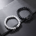 Dual-tone turquoise and lava stone hip-hop bracelet set featuring white turquoise beads and black lava stone beads with square accent in flat lay display