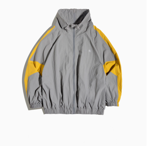 Dynamic Layering Jacket in Scottish Grey front view showing double zipper closure, elastic cuffs and gathered hem