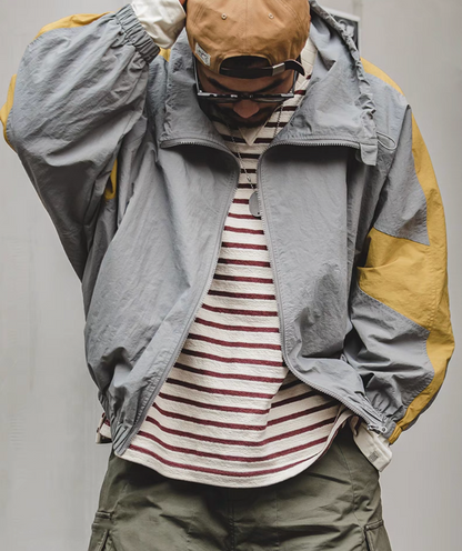 Scottish Grey Dynamic Layering Jacket worn open revealing layered outfit and showcasing versatile styling