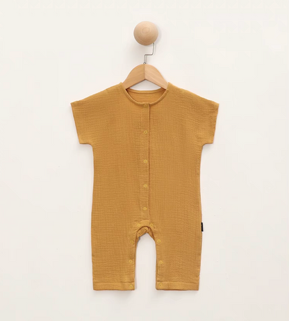 Yellow short sleeve baby romper hanging on wooden hanger front view