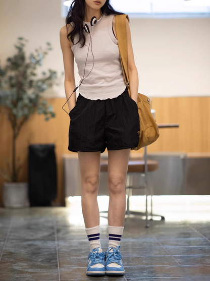 Effortless Sport Shorts black styled with tank top and sneakers in relaxed everyday outfit