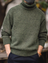Elbow Patch Turtleneck Sweater in olive green front view showcasing coarse knit texture foldable turtleneck and relaxed everyday fit