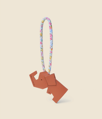 Coffee brown elephant keychain charm front view with floral strap detail
