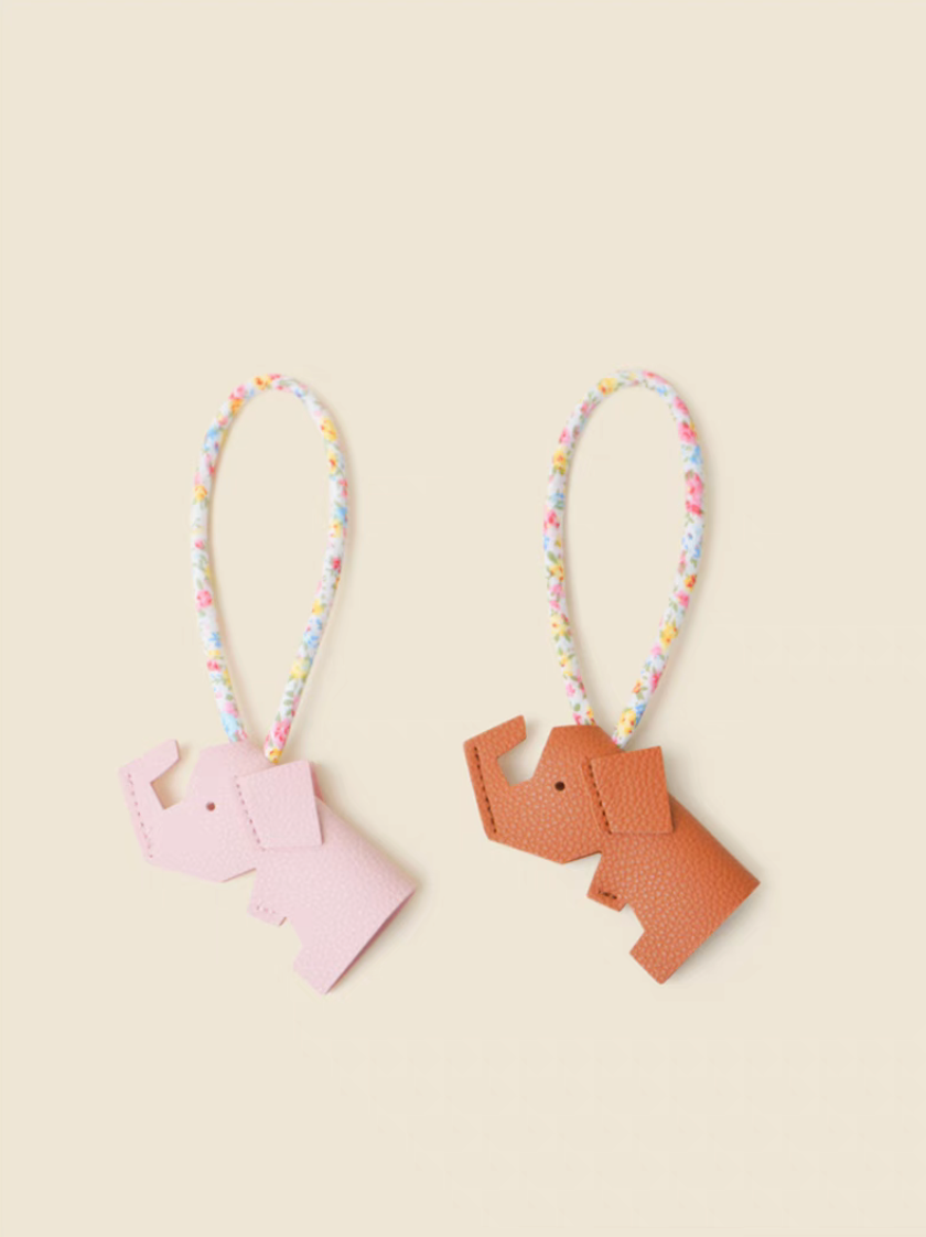 Elephant keychain charm in pink and coffee brown colors with floral strap overview