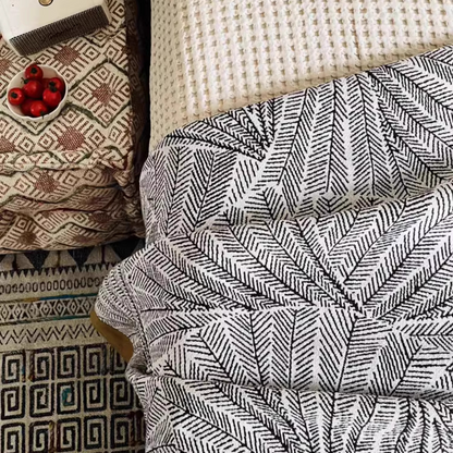 Close-up of Floral Cotton Gauze Blanket Leaf Vein showing breathable cotton gauze texture and leaf vein pattern