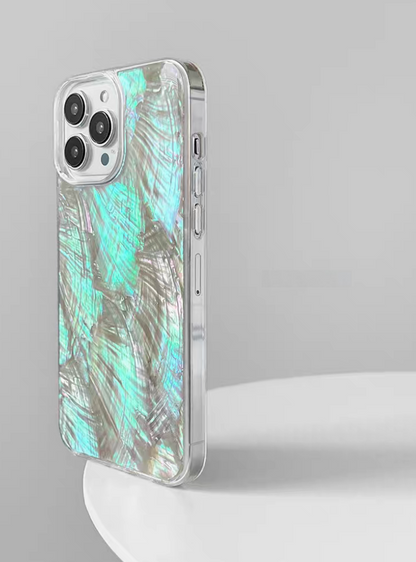 Natural mother-of-pearl shell phone case side angle with shimmering shell texture and clear frame