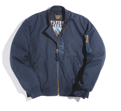 Deep navy MA-1 bomber jacket flat lay showing zip pocket and quilted interior.