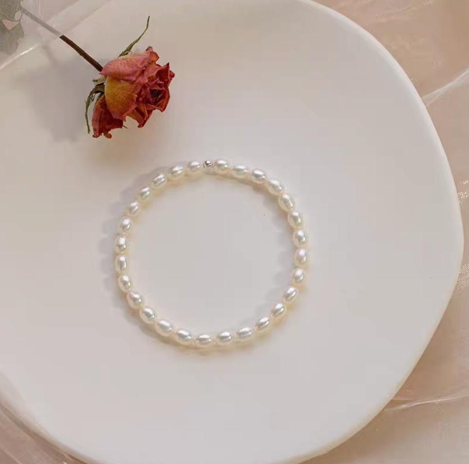 freshwater-pearl-stretch-bracelet-peachy-pink-stacked-multi-layer-display-09