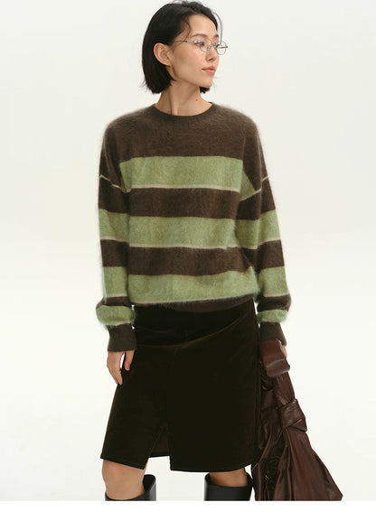model wearing brown green striped fuzzy alpaca sweater front view