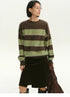 model wearing brown green striped fuzzy alpaca sweater front view