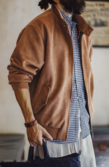 Man wearing camel suede Harrington jacket with high collar
