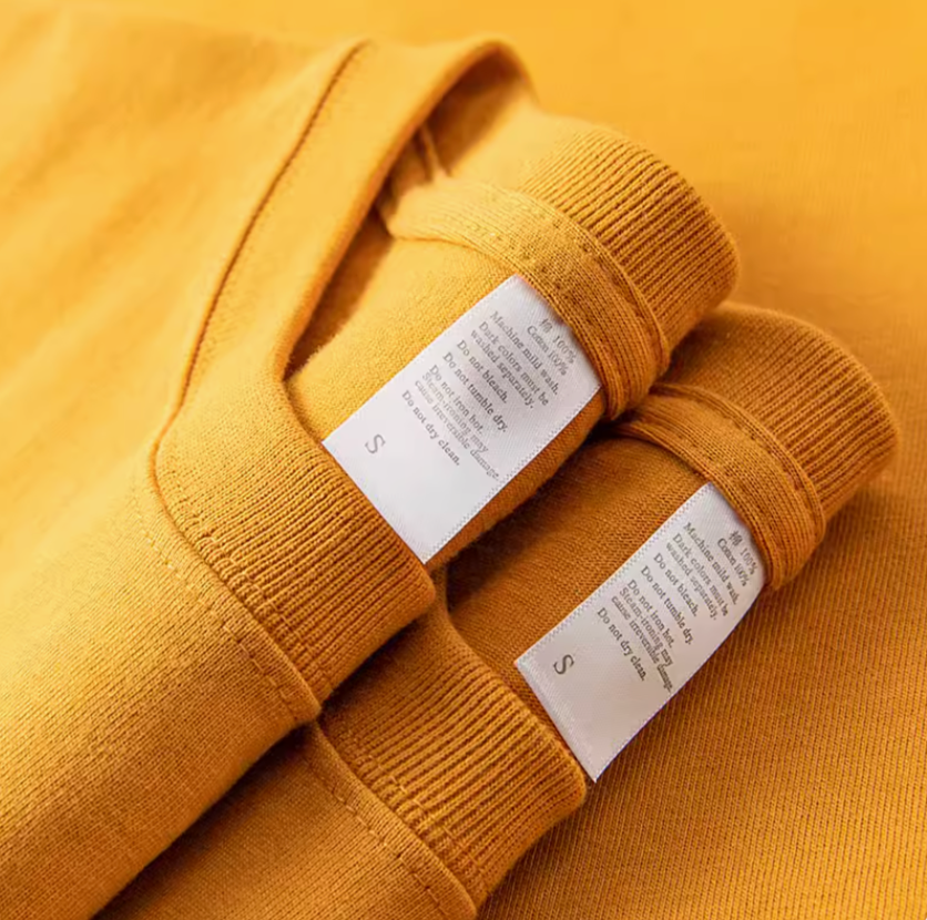 Golden Glow Tee mustard yellow color collar close-up with inner label and ribbed neckline detail