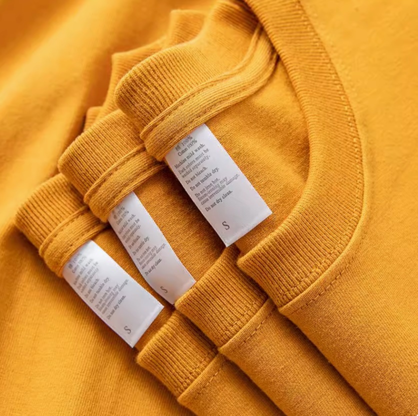 Golden Glow Tee mustard yellow color collar label detail showing crewneck stitching and size tags