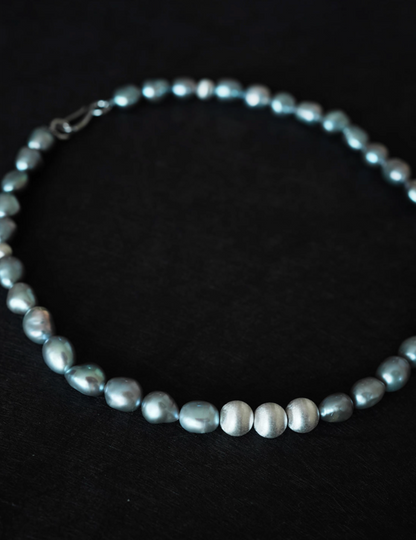 Close-up of Grey Pearl Silver Necklace showing natural grey freshwater pearl texture and luster