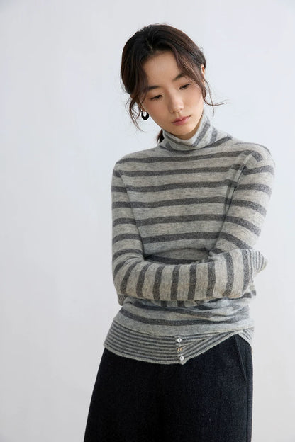 Grey stripe yak wool turtleneck, front view with arms crossed