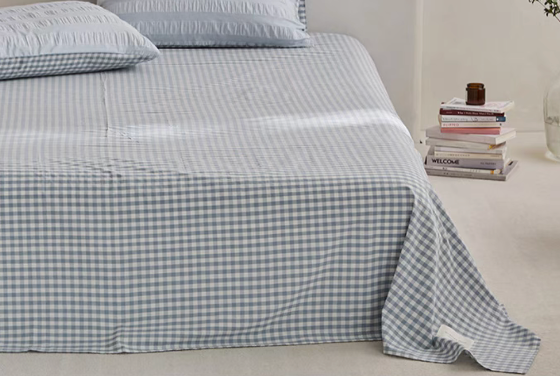 Light Blue Grid cotton checked sheet detail with matching textured stripe pillow shams