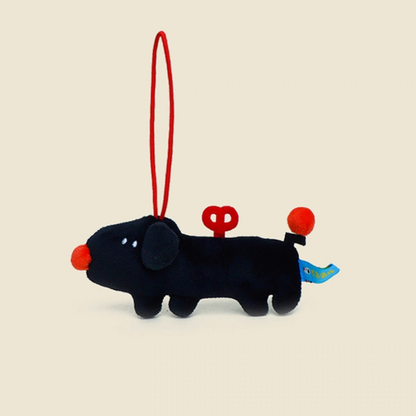Black handmade plush puppy charm keychain front view with cute wind-up feature and hanging strap