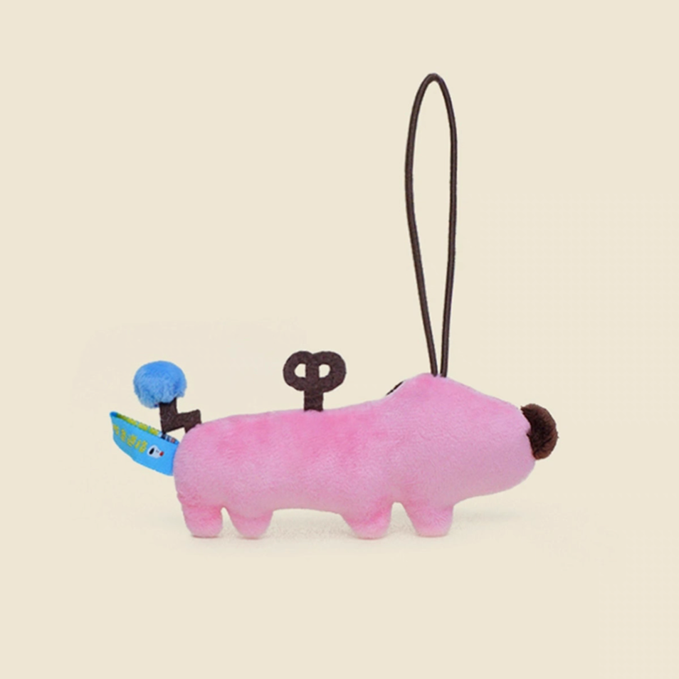 Pink plush puppy charm keychain side view showing wind-up tail detail and hanging loop