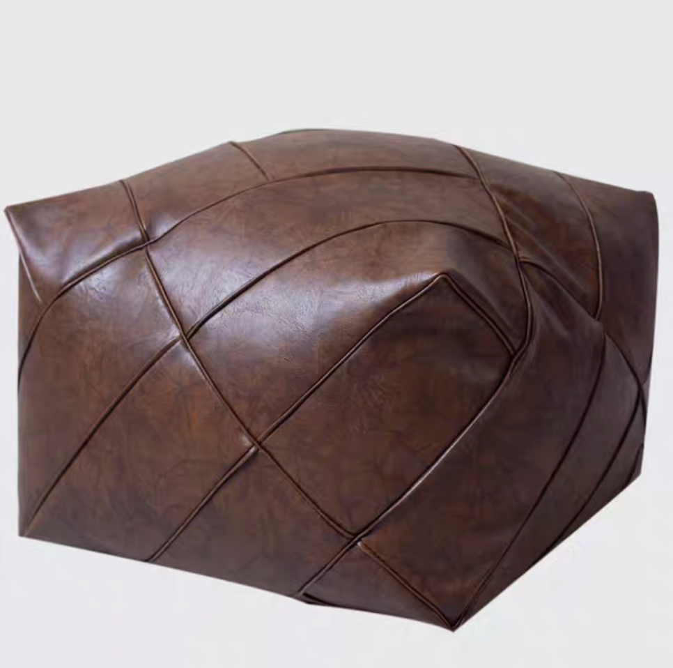 Brown coffee handwoven leather cube pouf with geometric stitched pattern shown in angled single product view