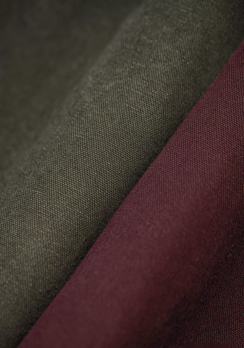 Close-up of the green and burgundy fabrics of the Hardman Detroit 90s Workwear Jacket, showing the durable texture.