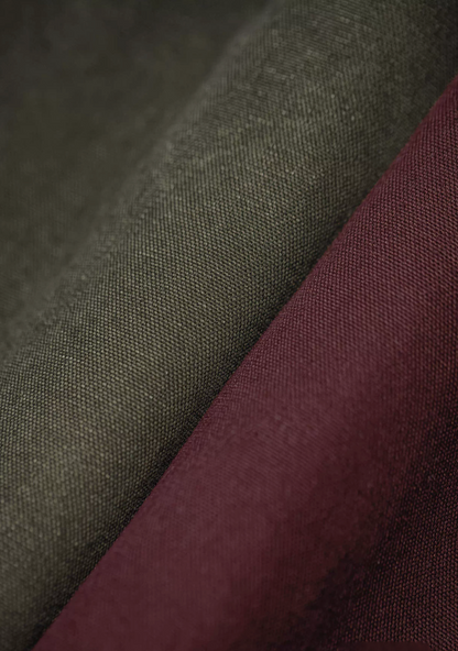 Close-up of the green and burgundy fabrics of the Hardman Detroit 90s Workwear Jacket, showing the durable texture.