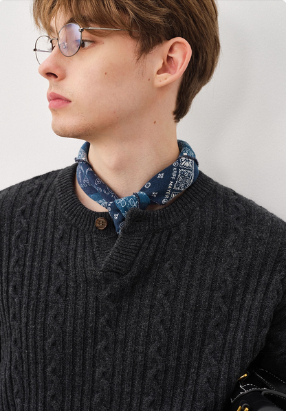 Smart casual styling with charcoal Henley wool sweater and beige pants