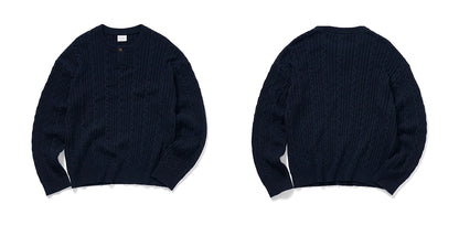 Flatlay front and back of navy Henley wool cable-knit sweater
