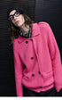 Hot Pink wool-blend cardigan showing collar, shoulder button tab and double row of black buttons