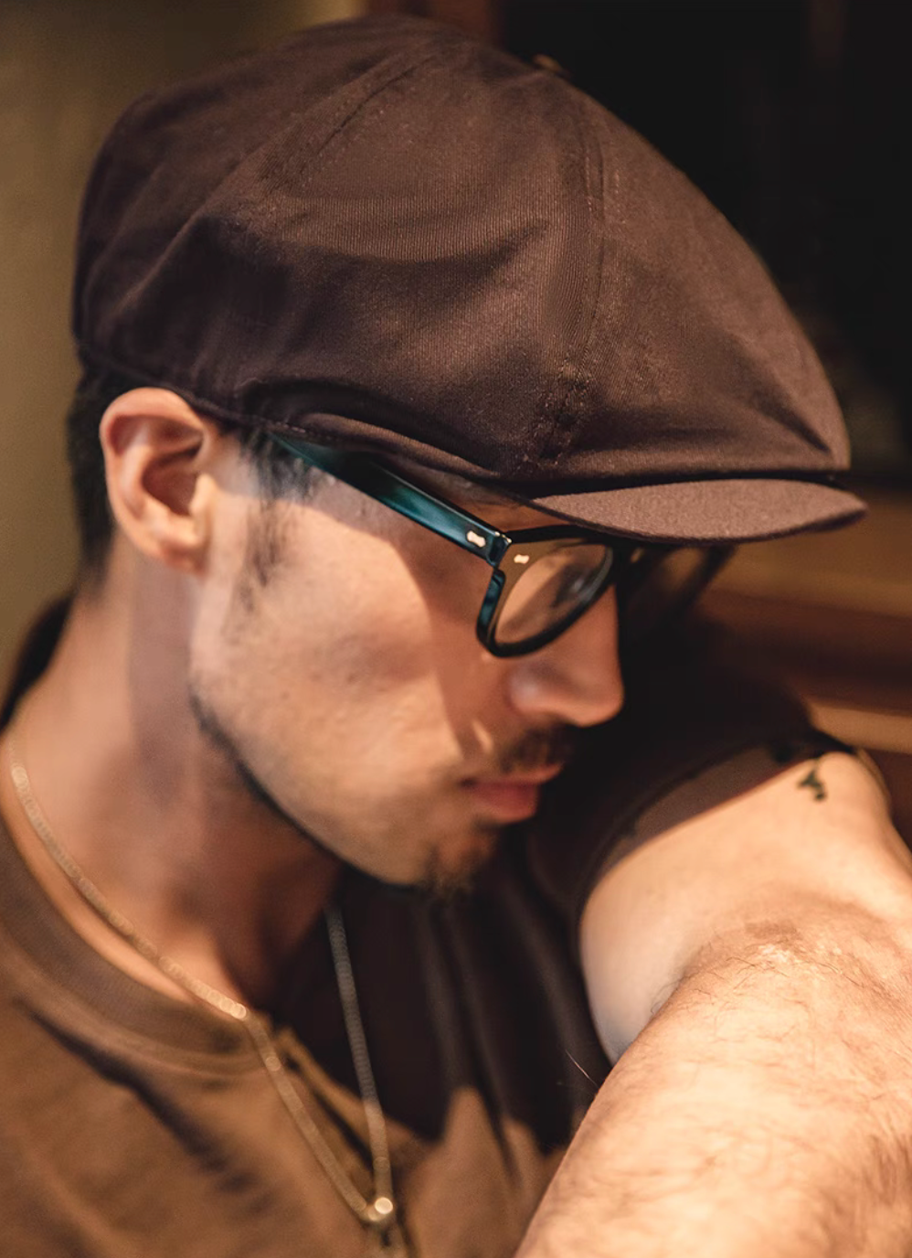 Close up of Hudson Cotton Blend Newsboy Cap coffee red highlighting textured cotton fabric stitching details and structured crown design
