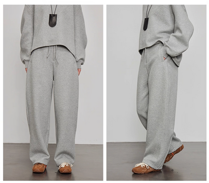Close-up of grey wide-leg pants waistband and pocket detail