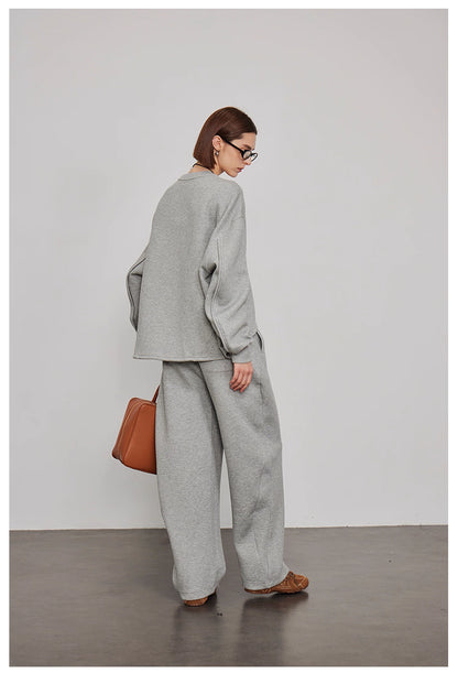 Back view of grey oversized sweatshirt with matching wide-leg pants
