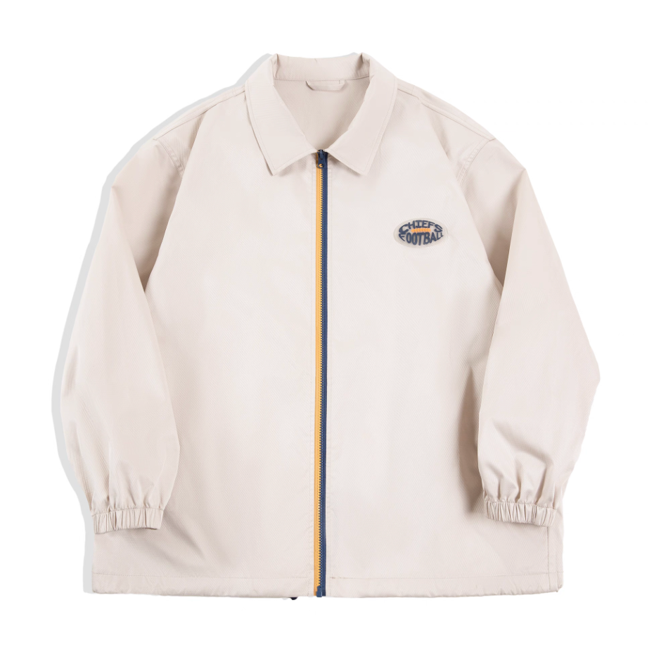 Off-White retro coach jacket with contrast blue-yellow zipper, front view.