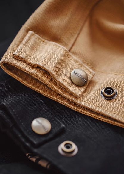 Ironclad Canvas Work Jacket close-up detail of cotton canvas fabric with metal snap button and reinforced stitching