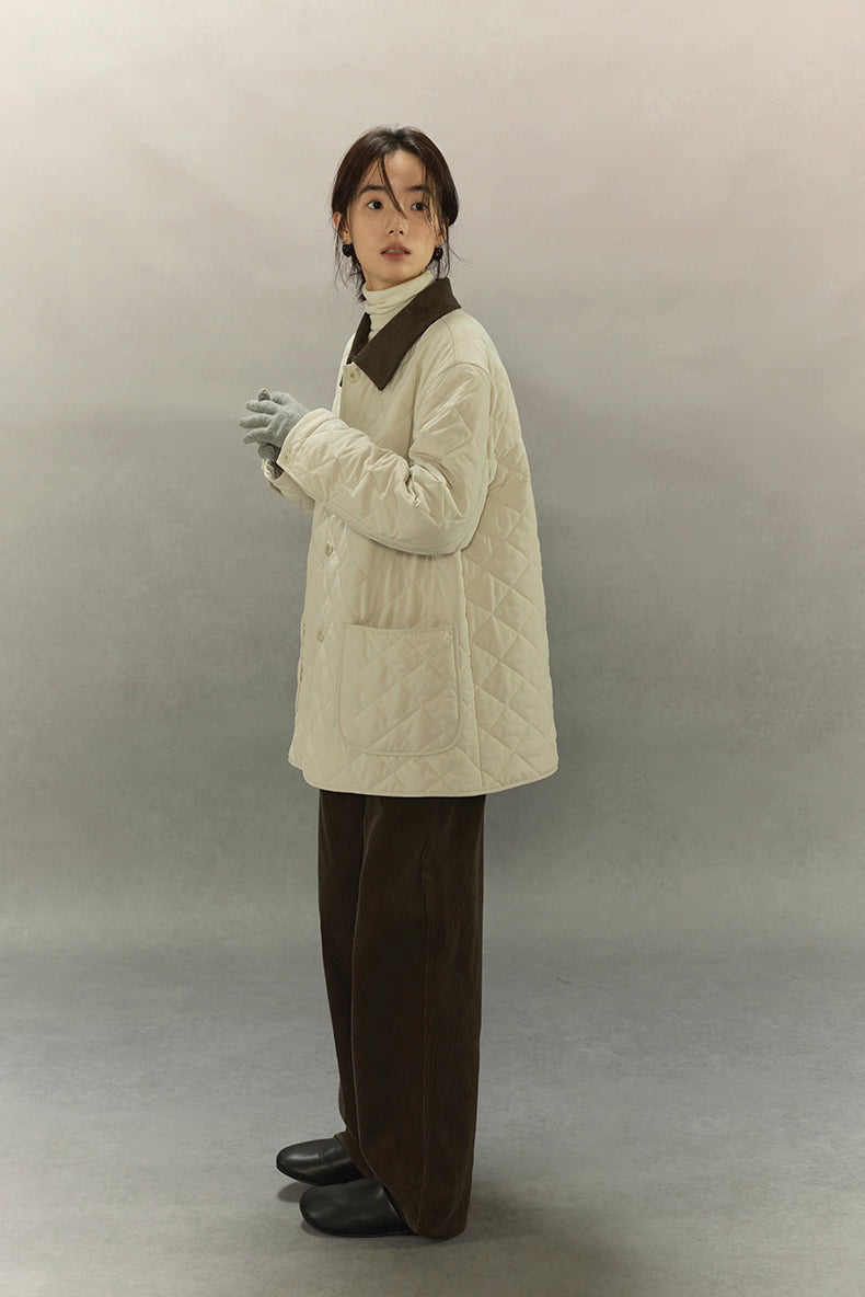 side stance showing relaxed fit and corduroy collar contrast