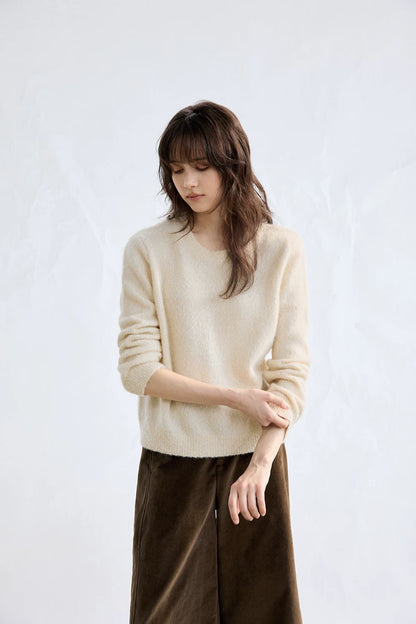 Ivory flecked cashmere sweater, front view on model
