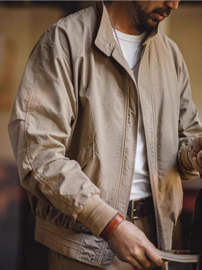 Lifestyle photo of khaki Harrington G9 Taslon jacket styled for daily wear