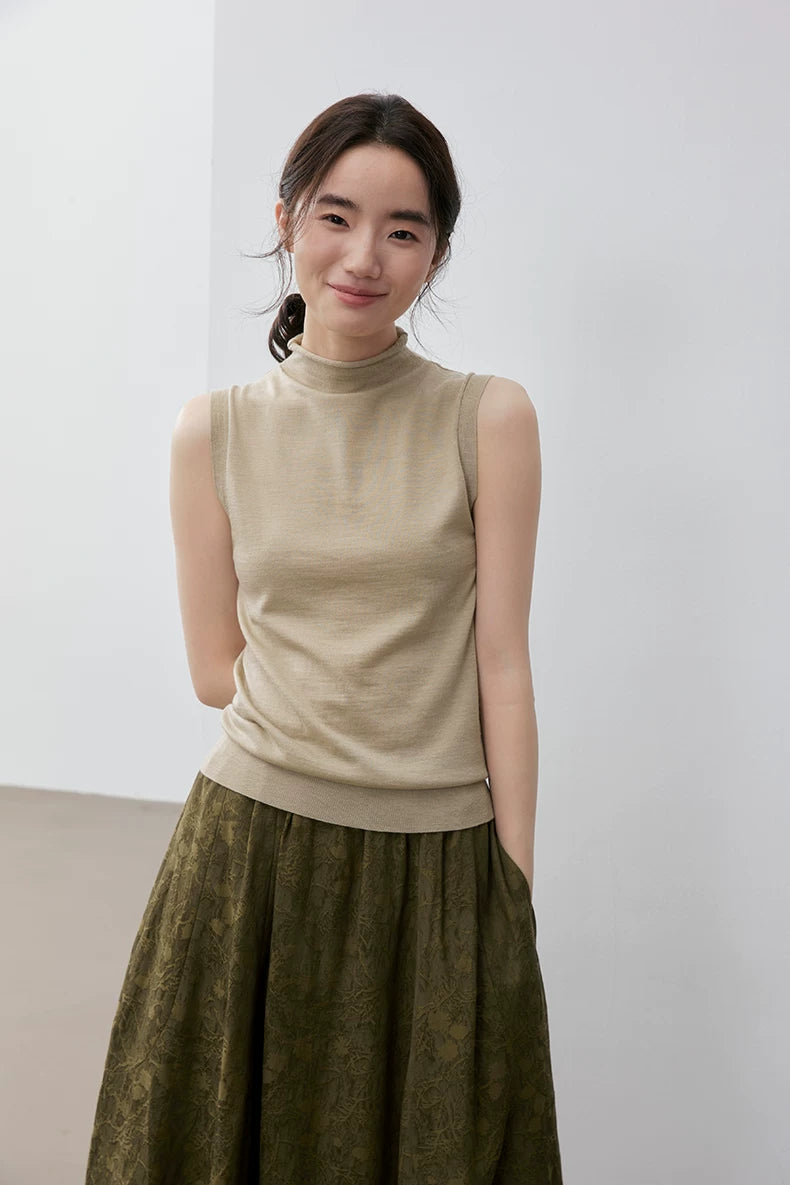 Waist-up front view of Khaki wool blend sleeveless knit top with mock neck