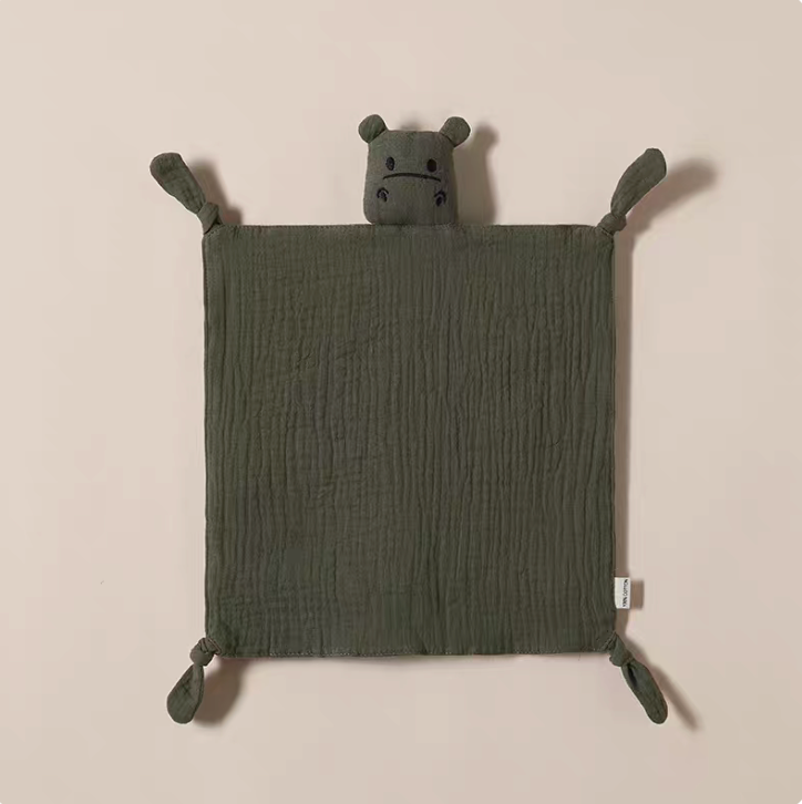 Olive Green muslin baby comfort cloth with plush animal head and knotted corners on neutral background