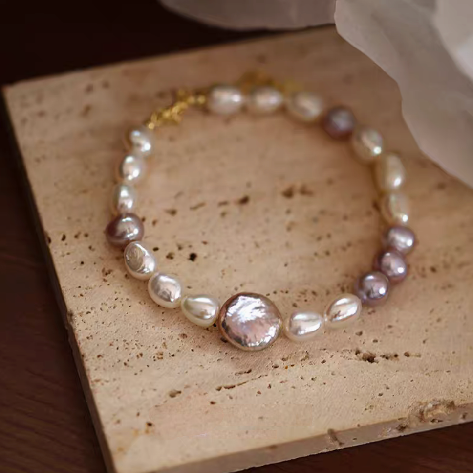 Lavender baroque pearl bracelet with natural freshwater pearls close-up detail showing unique organic pearl shapes and soft luster