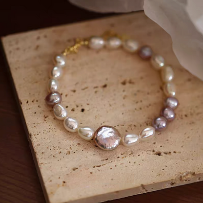 Lavender baroque pearl bracelet with natural freshwater pearls close-up detail showing unique organic pearl shapes and soft luster